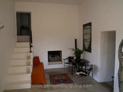 Partial view of the living room with fireplace