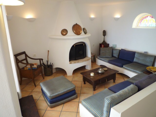 Living area with open fireplace