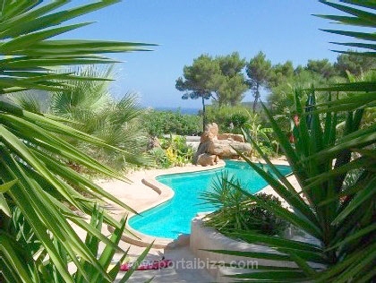 The swimming pool is surrounded by sunny terraces