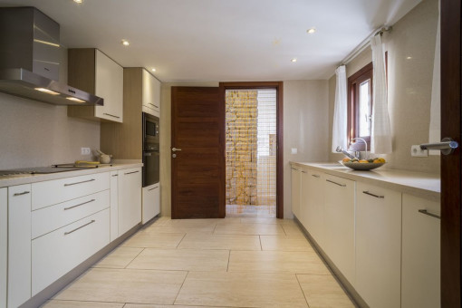 Fully equipped kitchen in white