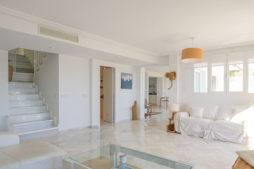 Living area with staircase to the upper floor